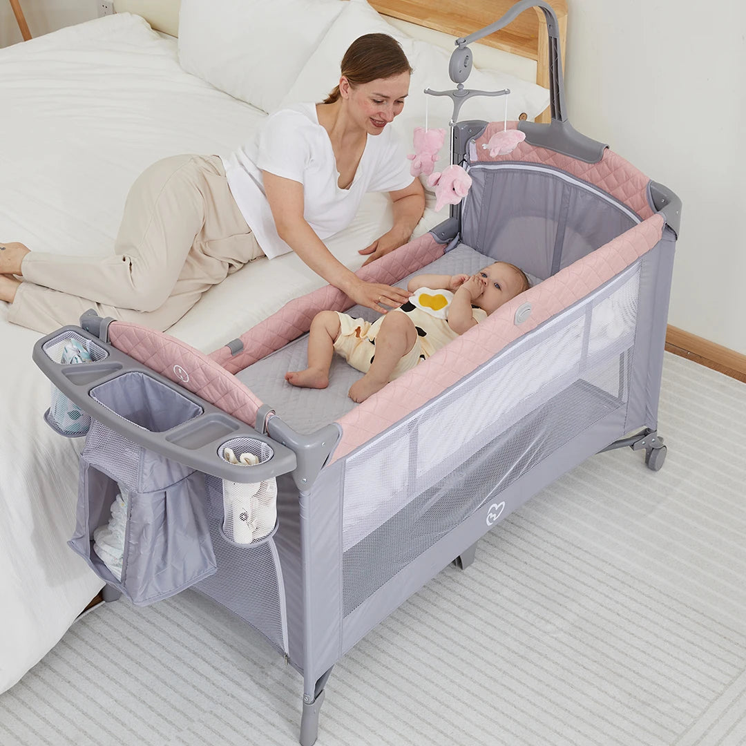 Cheap Hot Sale OEM Adjustable Baby Travel Rollaway Bed Bedside Crib Side Bed with Wheels and Diaper Table for 0 to 3 Years