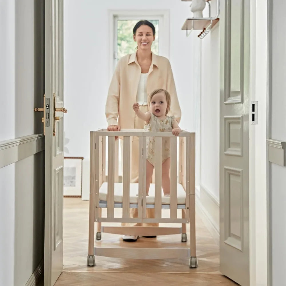 EvoNook 6 In 1 Convertible Mini Crib With Wheels Easy Build