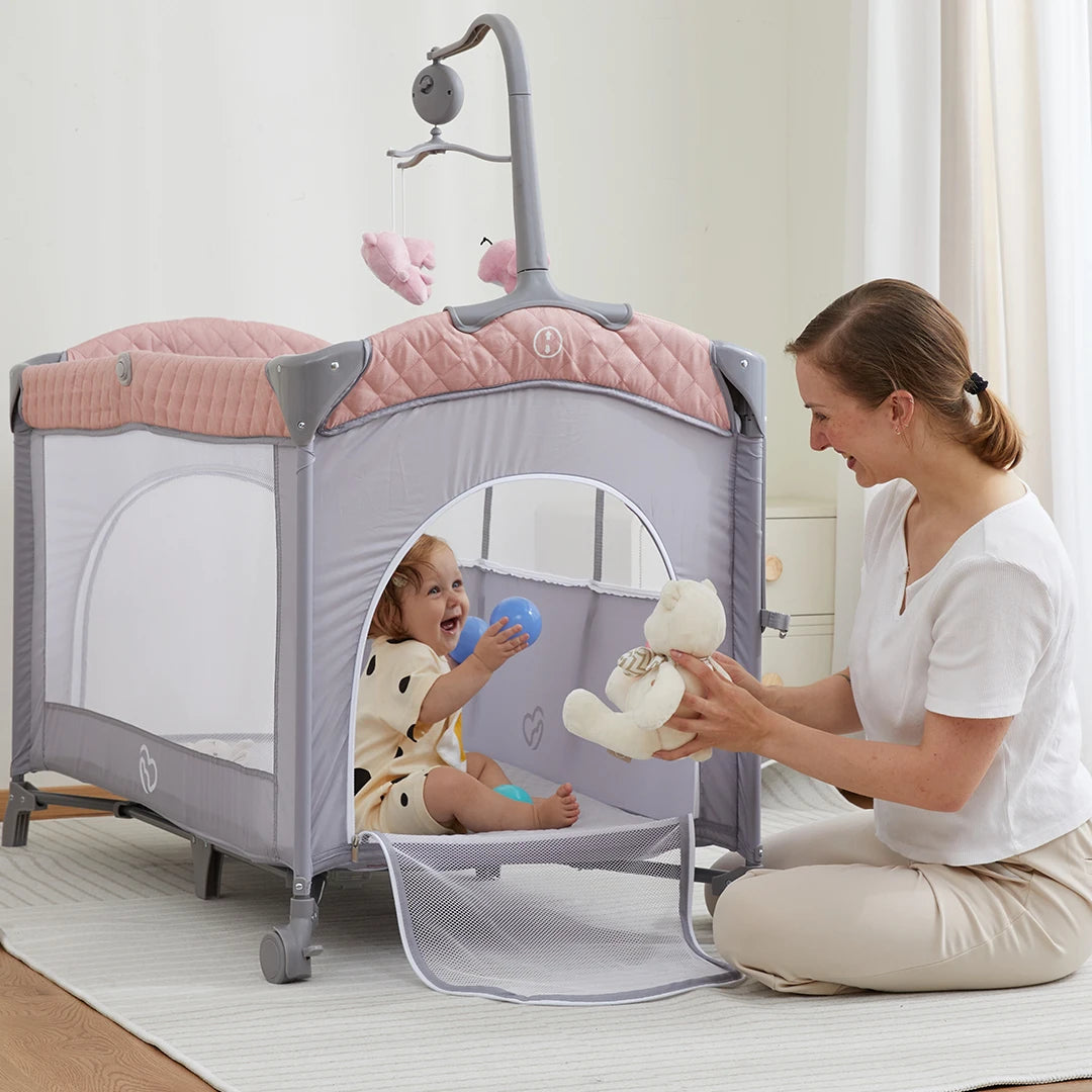 Cheap Hot Sale OEM Adjustable Baby Travel Rollaway Bed Bedside Crib Side Bed with Wheels and Diaper Table for 0 to 3 Years