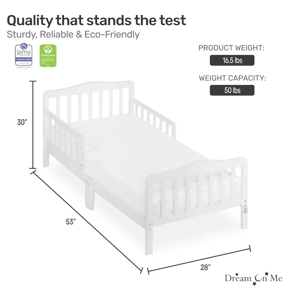 Classic Design Toddler Bed In White Low To Floor Design With Two Side Rails Non Toxic Finishes Wooden Nursery Furniture